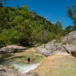 © See the famous Rochecolombe waterfall flowing down the river - © Matthieu Dupont