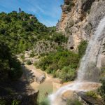 © See the famous Rochecolombe waterfall flowing down the river - © Matthieu Dupont